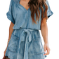 Chic denim romper with notched neckline and adjustable tie waist for a perfect fit. Versatile, comfortable, and perfect for summer days.