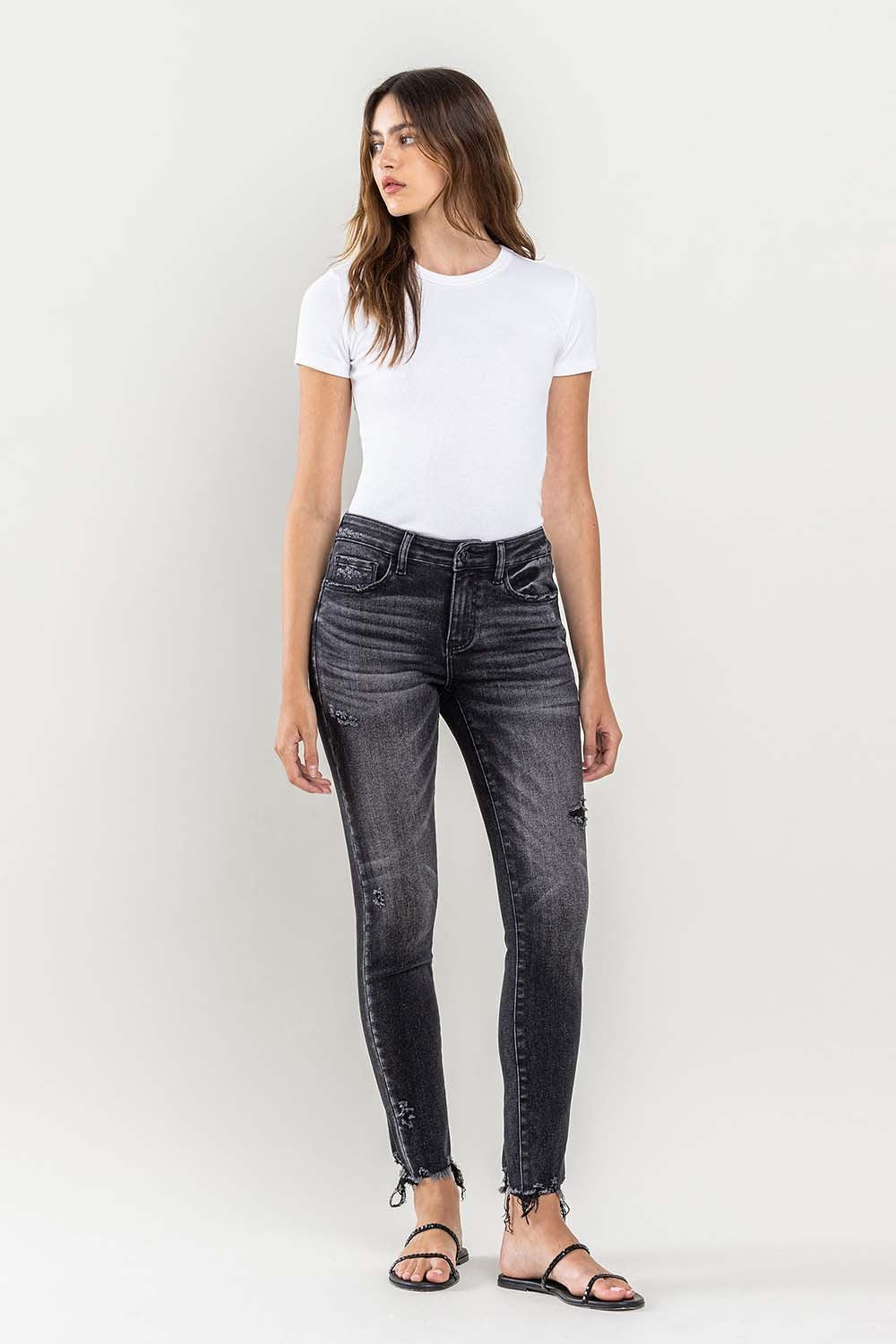 Chic Lovervet Skinny Jeans with a comfy stretch, edgy raw hem, and a versatile cropped cut for day-to-night style. Elevate your denim game!