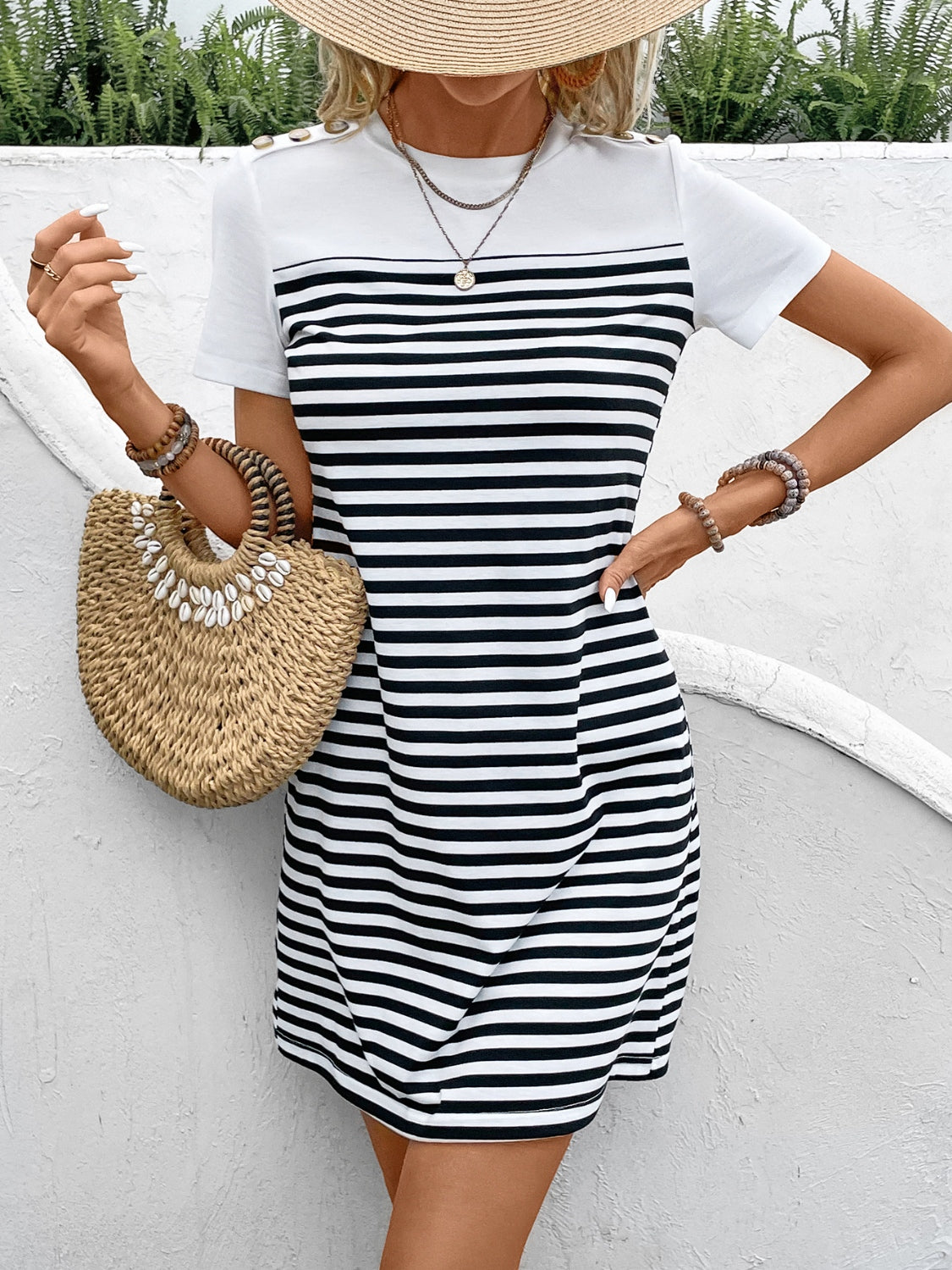 Shop the chic navy & white striped tee dress - a perfect mix of style & comfort. Take your wardrobe to the next level with this easy-to-style piece!