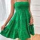 Chic sleeveless smocked green dress with tiered skirt, perfect for summer. Available in 8 colors. Get yours today!