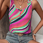 Playful sleeveless top with multicolor stripes and button accents.