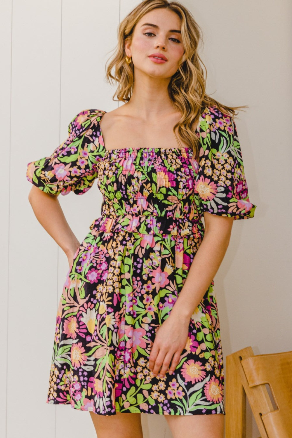 Brighten your wardrobe with ODDI's Floral Tie-Back Mini Dress - a perfect blend of comfort, style, and vibrant floral elegance