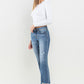 Turn heads with Lovervet Jeans featuring a trendy mid-rise fit and stylish frayed hems. Perfect for day-to-night looks.
