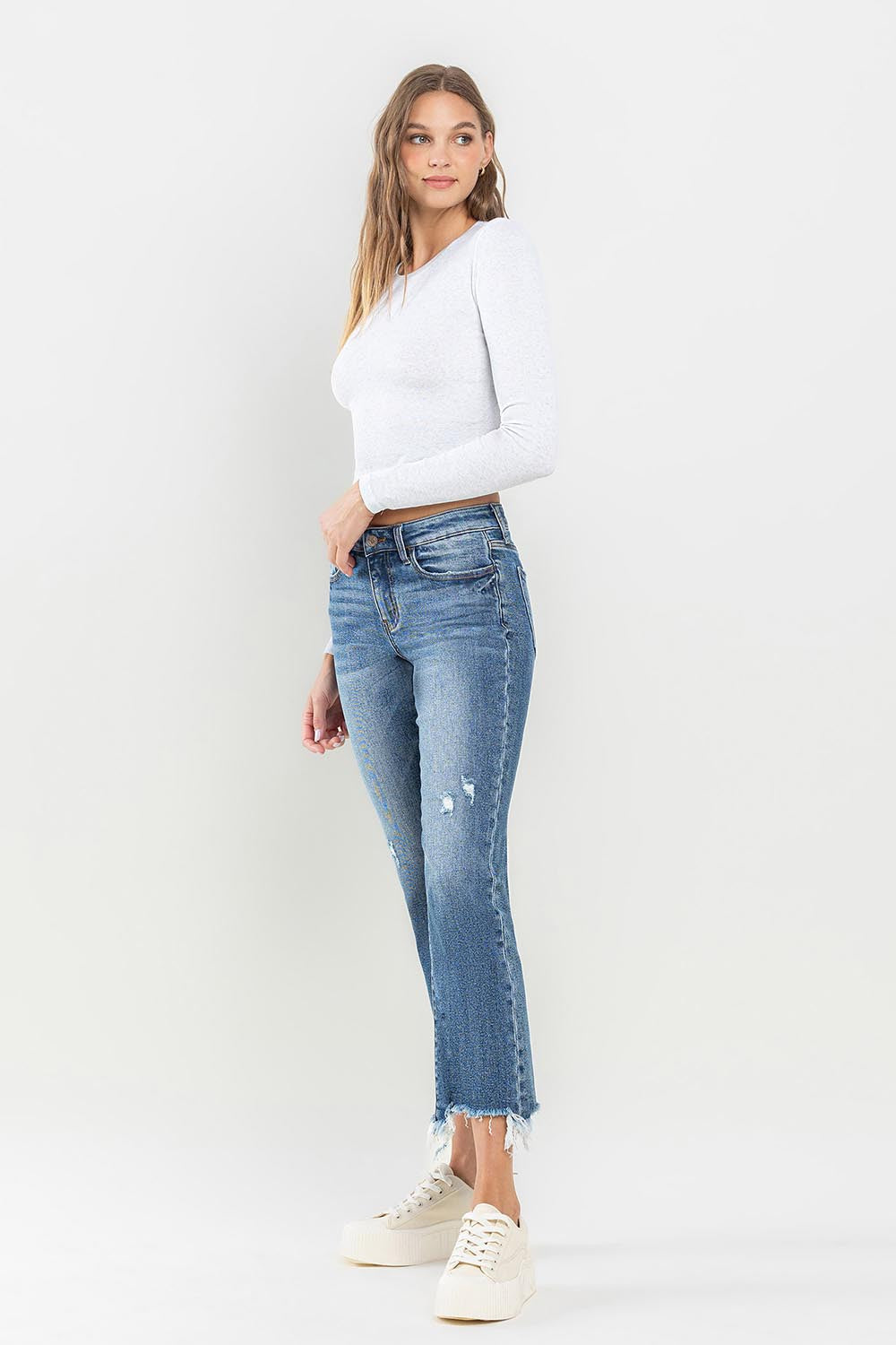 Turn heads with Lovervet Jeans featuring a trendy mid-rise fit and stylish frayed hems. Perfect for day-to-night looks.