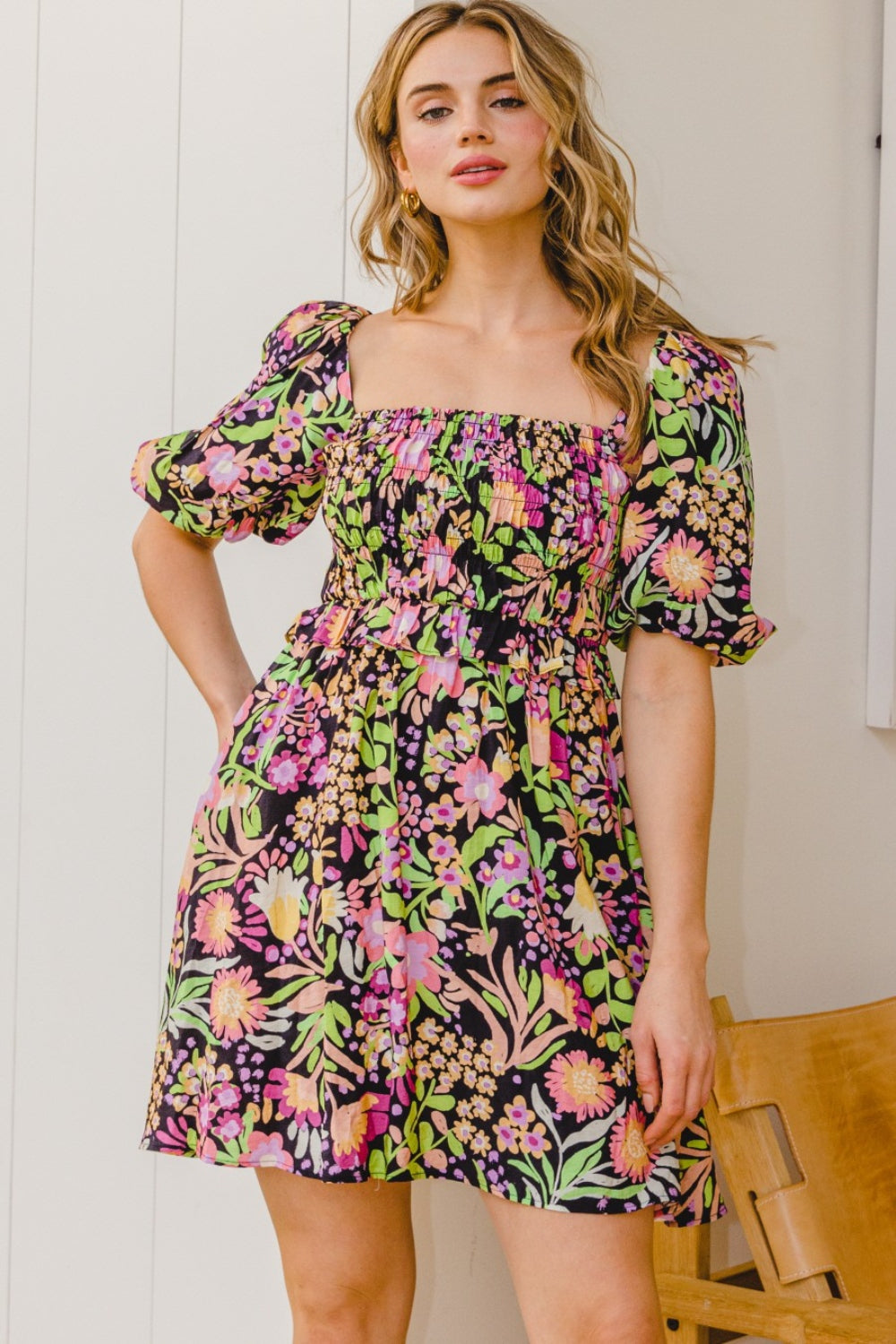 Brighten your wardrobe with ODDI's Floral Tie-Back Mini Dress - a perfect blend of comfort, style, and vibrant floral elegance