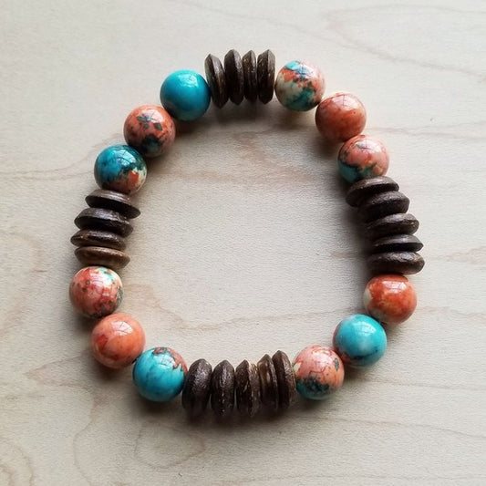 Handcrafted bracelet featuring turquoise and coral beads with wooden discs.