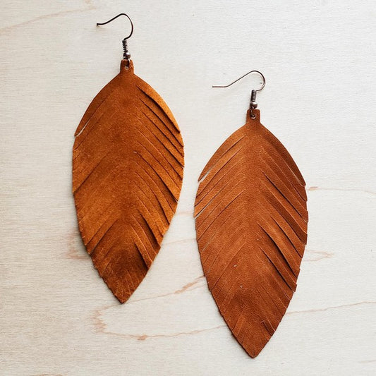 Brown leather feather-shaped earrings with a detailed cut-out design