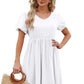 White casual dress with a V-neck and elastic waist.