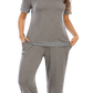 Experience cozy chic with our Round Neck Capri Lounge Set. Perfect for stylish comfort at home or out. Available in gray, navy, and red.