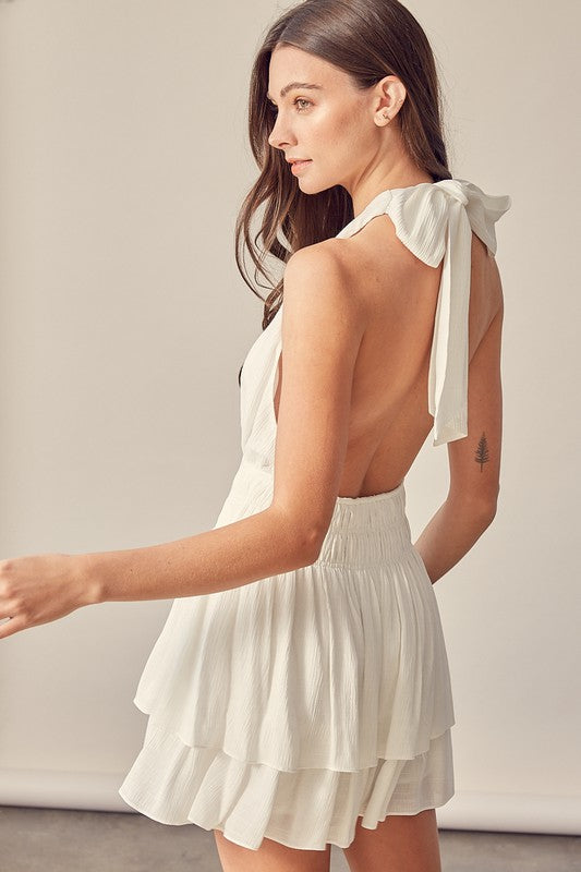 Light white dress with a halter neckline and layered skirt