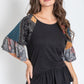 Black peplum shirt with mixed-patterned ruffle sleeves