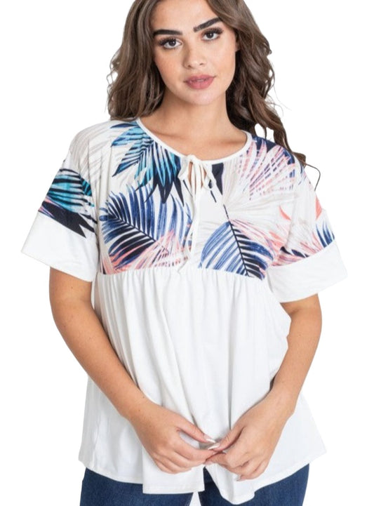 Colorful tropical leaf print top with short sleeves and tie-neck feature.