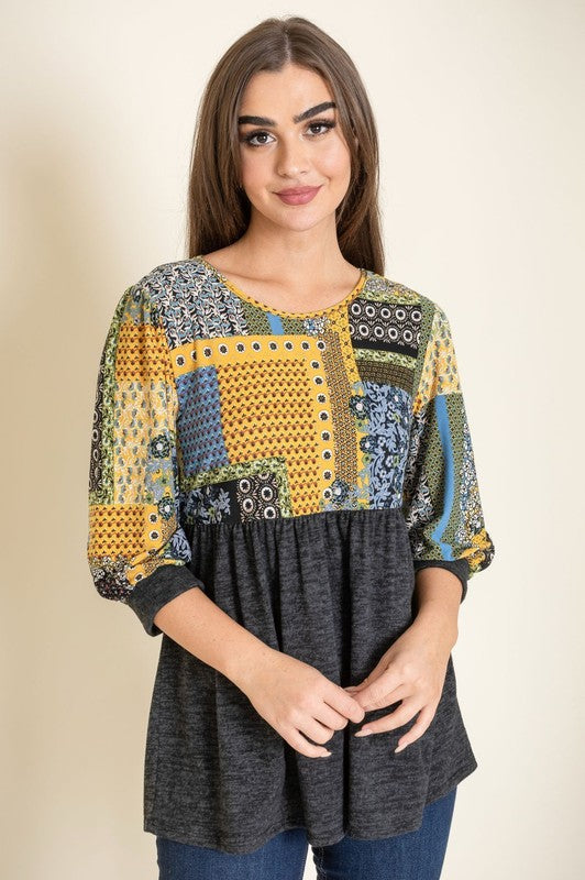 Stylish plus size blouse with mixed pattern details