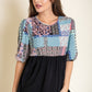 Elegant plus size blouse with colorful patchwork detail