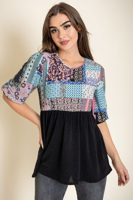 Plus size blouse with a mix of patterns and solid bottom