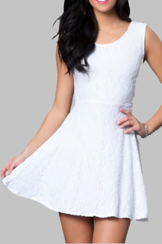 Elegant white lace dress featuring a feminine bow-back.