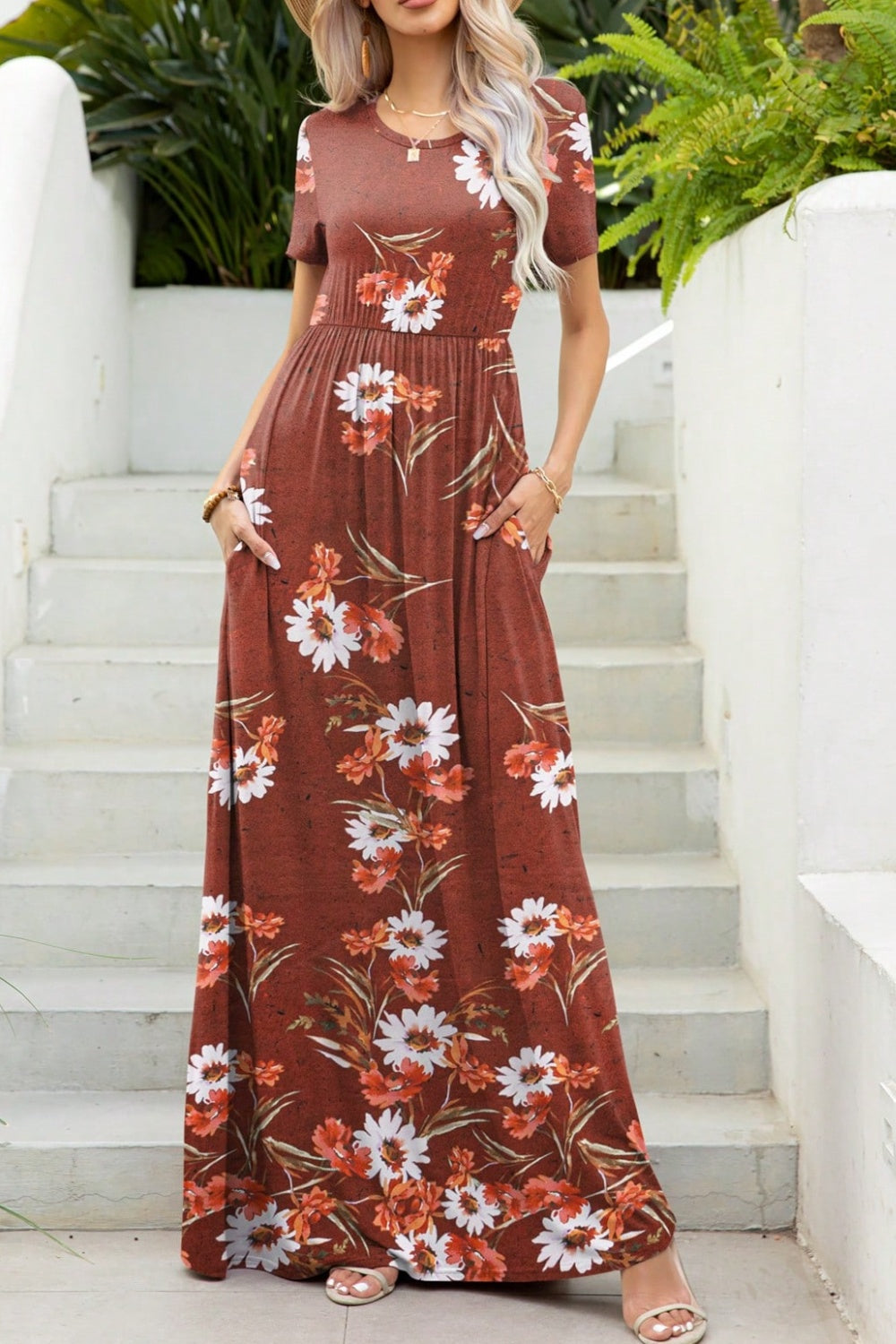 Stylish rust-colored maxi dress with white floral print