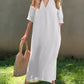 White maxi dress with a chic V-neck and comfortable fit.