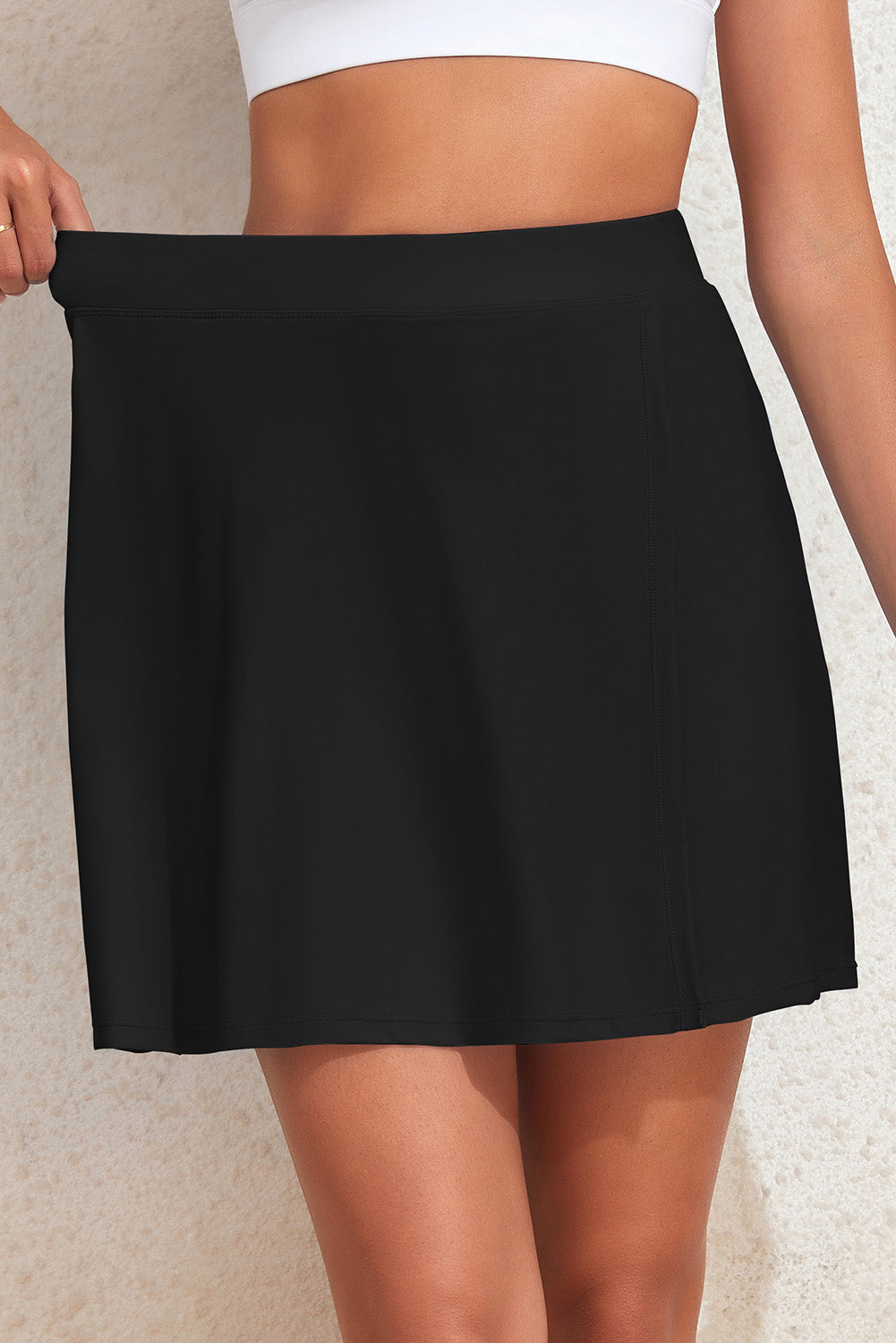 Versatile Slit Swim Skort with pockets - ideal for stylish comfort during beach activities & water sports. Perfect summer wear for active women.