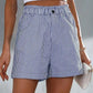 Chic striped shorts with pockets for stylish comfort. Perfect for versatile, everyday wear.