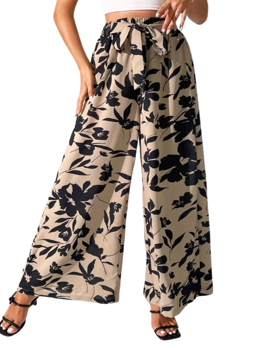 Upgrade your style effortlessly with our Printed Tied Wide Leg Pants. Chic, comfortable, and versatile - perfect for any occasion. Shop now!