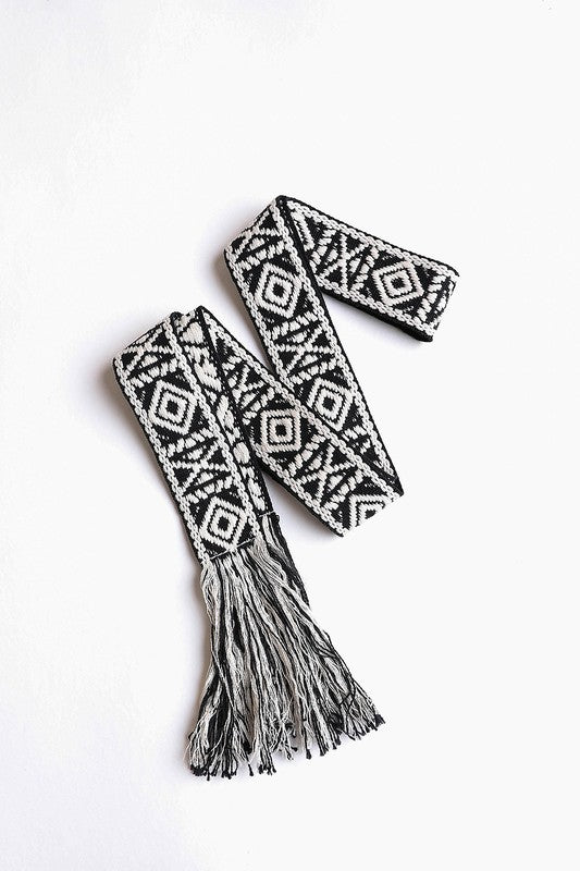 Elegant black boho belt with a geometric design and tassel embellishments