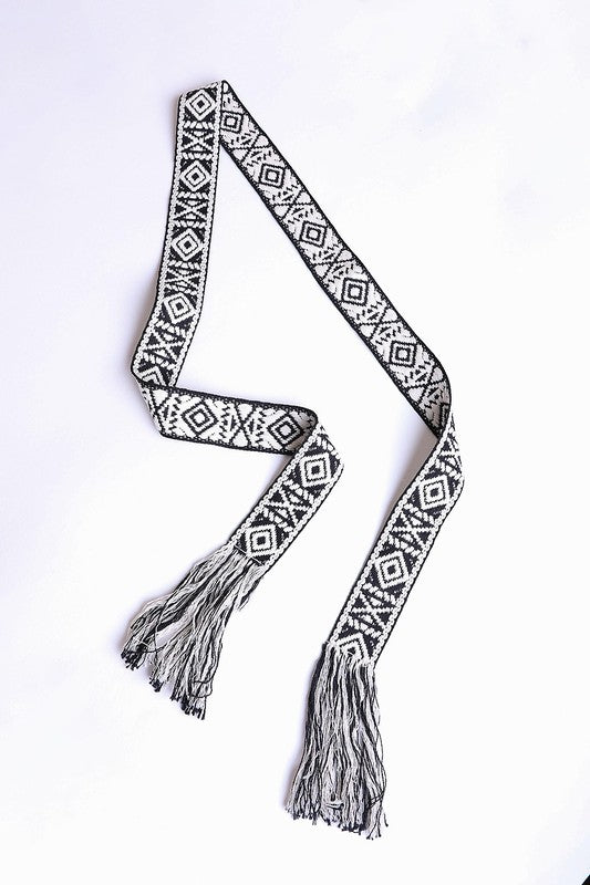 Bohemian black belt with detailed geometric patterns and tassel accents