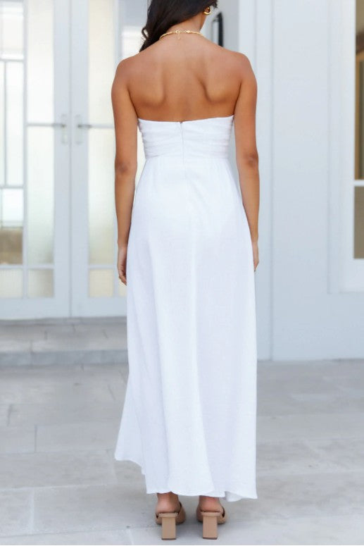 Flowy white maxi dress perfect for special occasions.