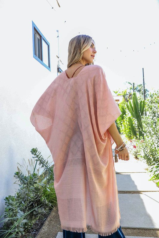 Pink breezy kimono suitable for all occasions.