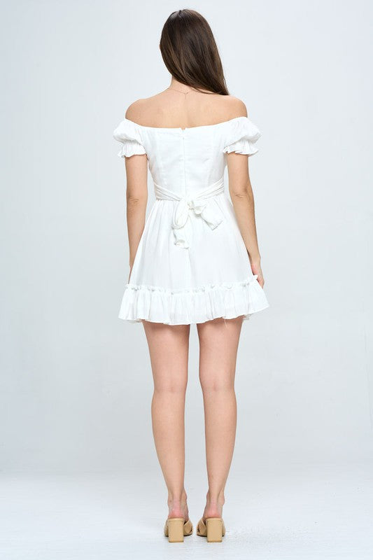 Lightweight, breathable off-shoulder white dress for summer.