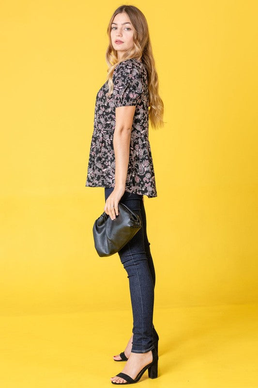 Classic black peplum blouse with floral paisley design