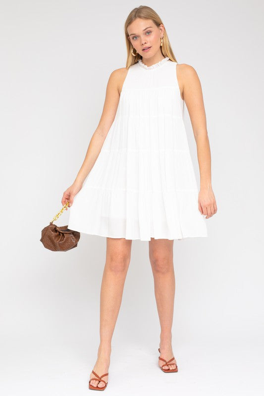 Versatile white dress perfect for casual outings and special occasions.