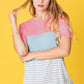 Modern color block tee with pink, blue, and gray stripes