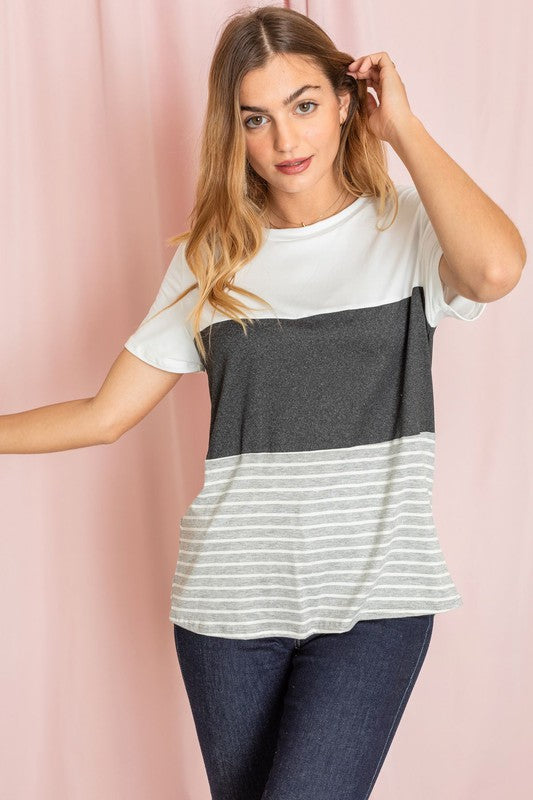 Comfortable tee with color block pattern in black, white, and gray stripes