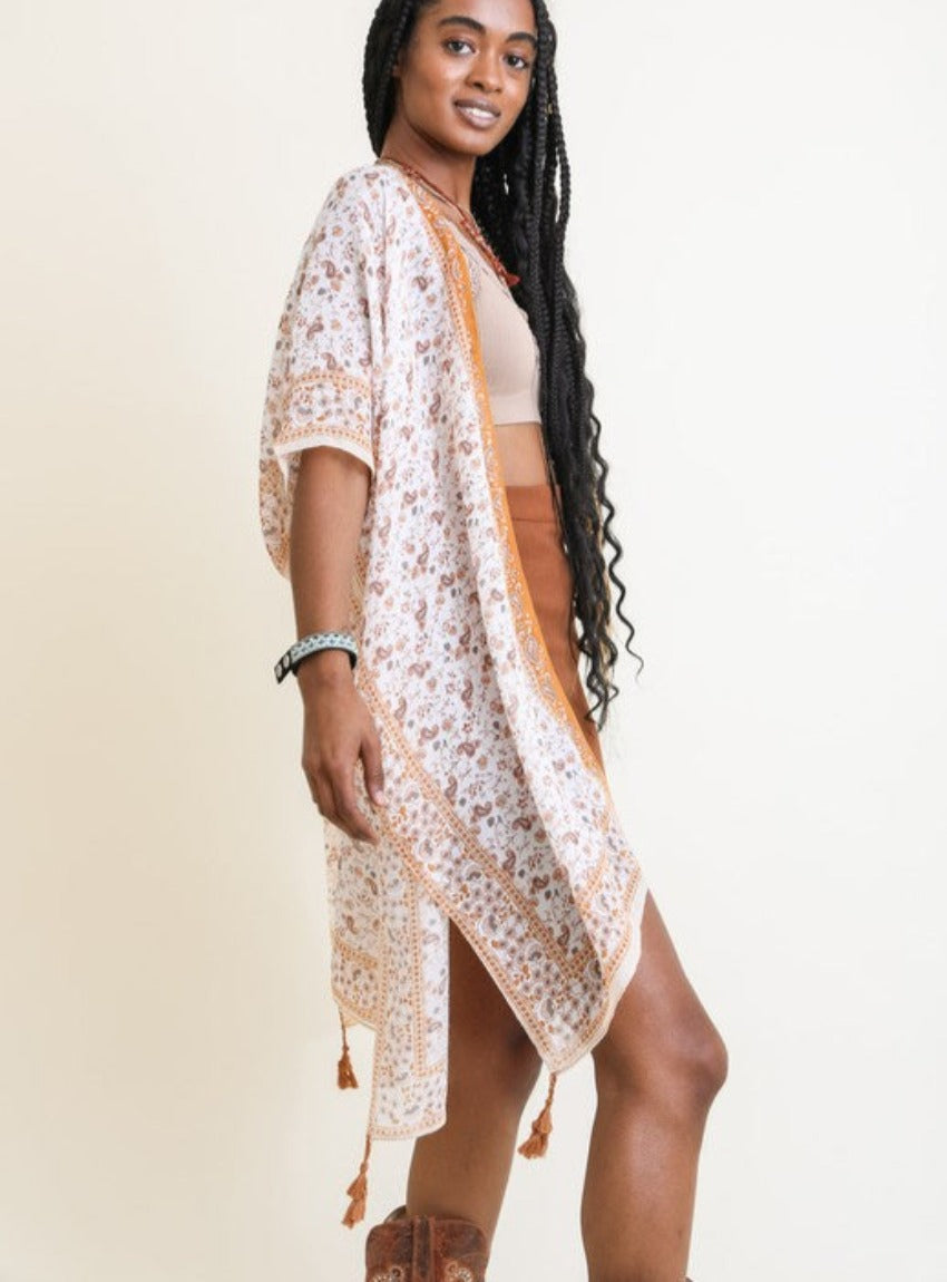 Lightweight kimono with yellow and orange patterns, perfect for summer.