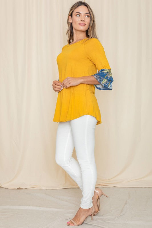 Yellow tunic top with floral detailed sleeves