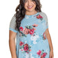 Floral Stripe Delight Top with bold floral and striped design.