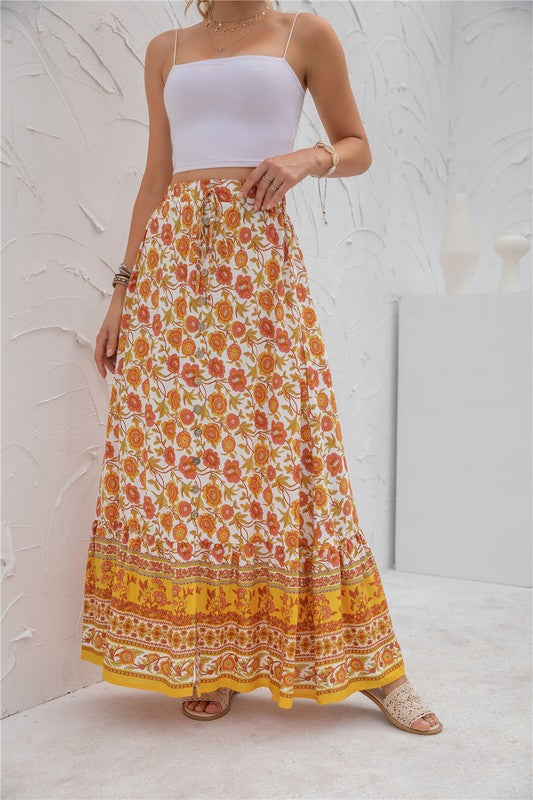 Bohemian orange floral maxi skirt with flowy silhouette