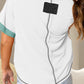 Stylish white V-neck tee with black and aqua color block details.