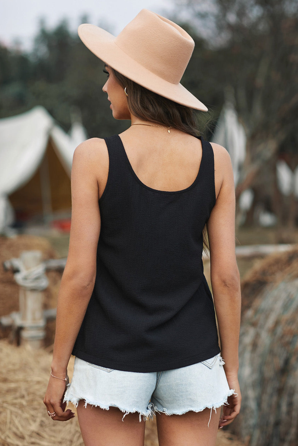 Versatile Scoop Neck Tank with stylish button front, available in black & white. Perfect blend of elegance and comfort for any occasion.