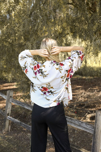 White kimono with colorful floral design