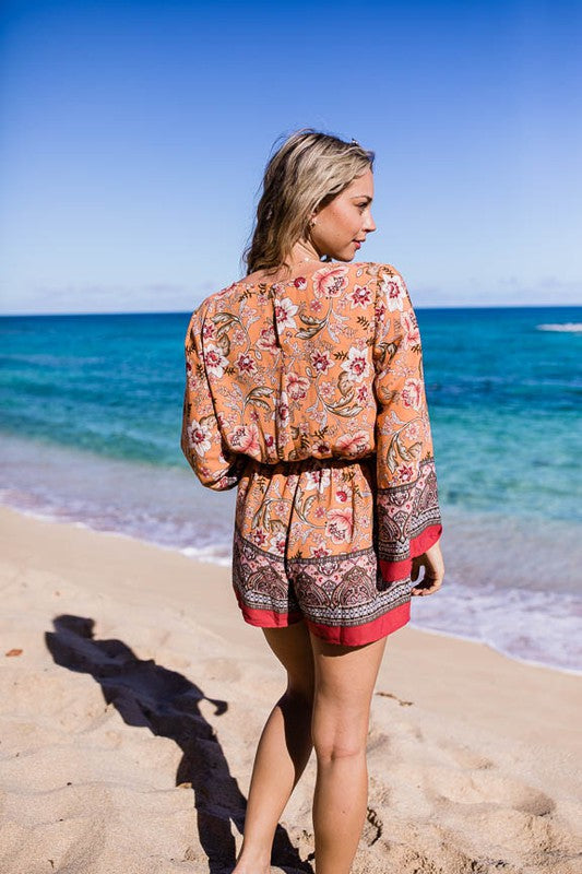 Breathable floral romper with a flattering fit and bohemian style
