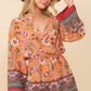 Summer romper with vibrant floral design and comfortable fit