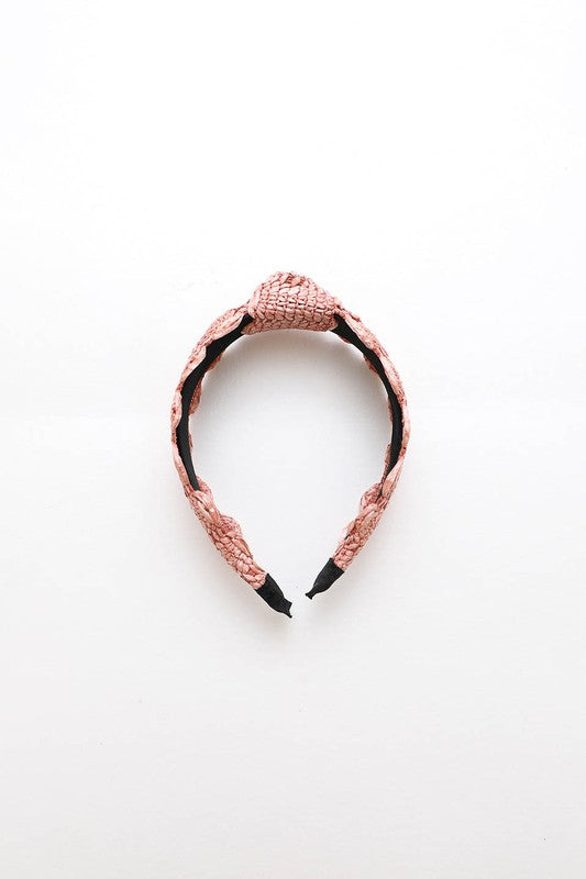 Intricately designed pink headband for daily wear