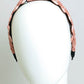 Fashionable pink headband with unique weaving