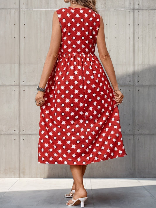 Lightweight red dress with daisy print and gathered waist.