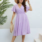 Plus Size Printed Smocked Waist Surplice Dress