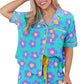 Snuggle up in our cozy Flower Print Pajama Set with adjustable drawstring for the perfect fit. Available in vibrant colors to brighten your nights.