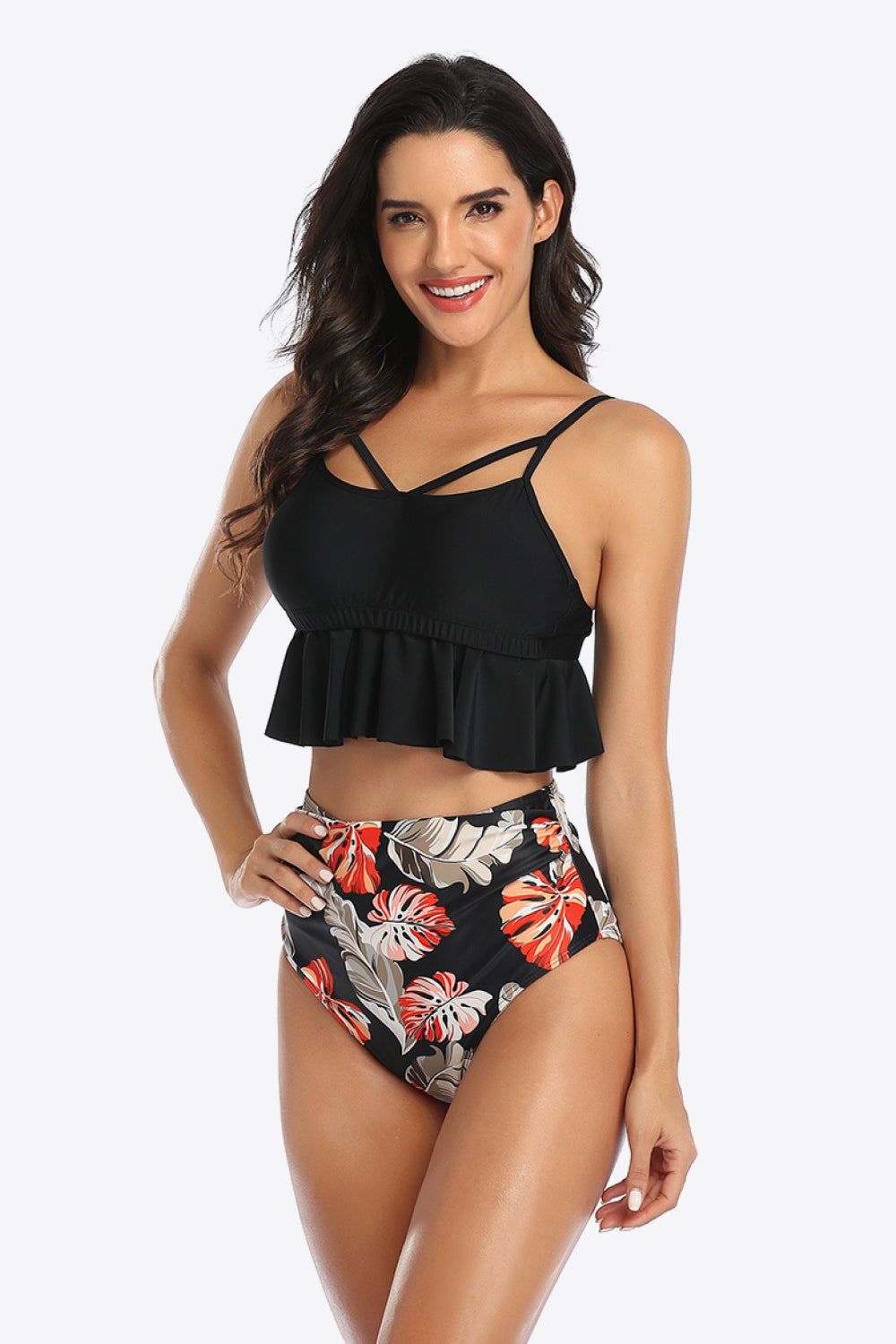 Dive into style with our Tropical Print Ruffled Two-Piece Swimsuit. Perfect fit, vibrant colors, and ultimate comfort for your sunny getaways.