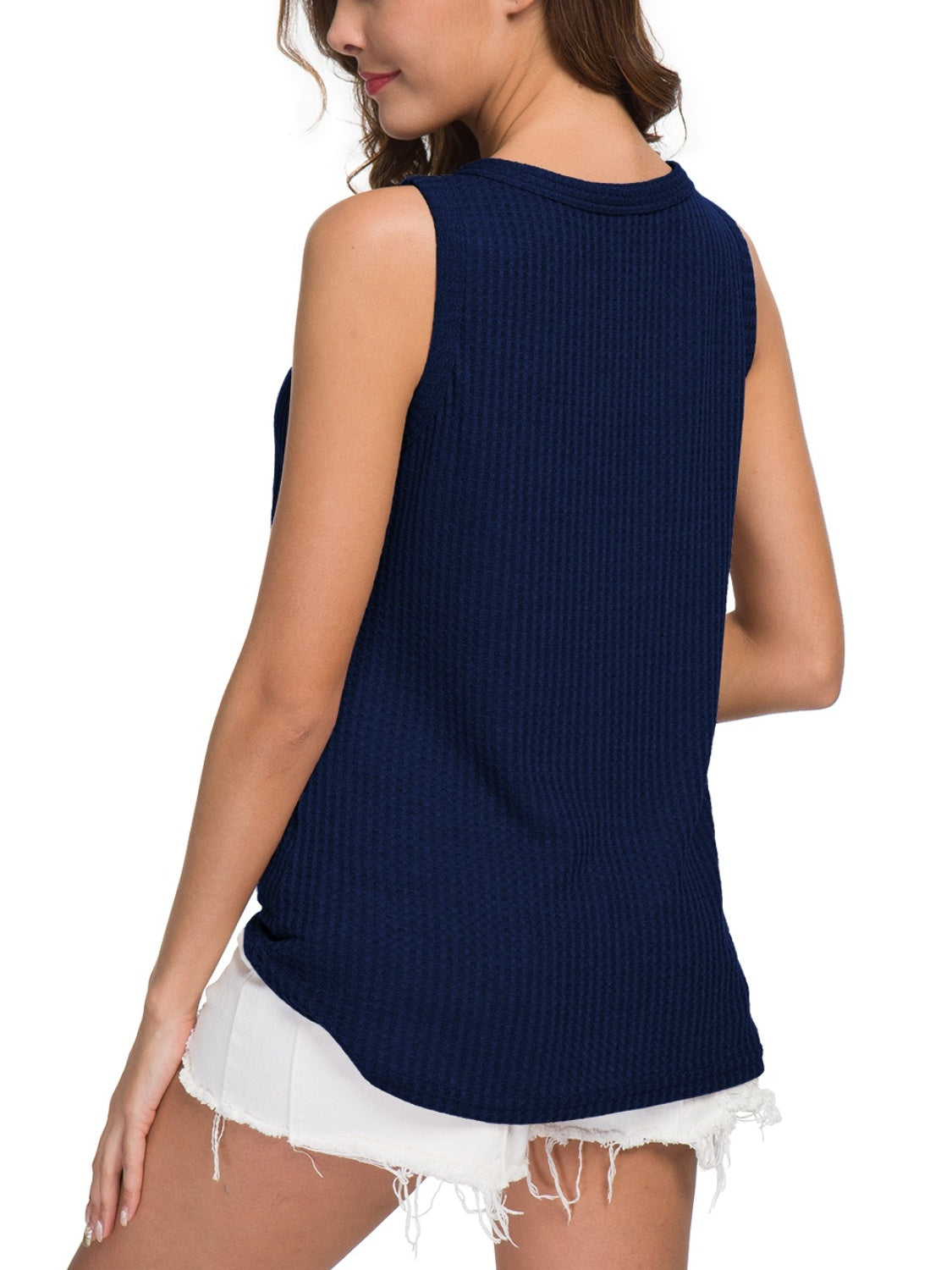 Navy sleeveless blouse with button-down front and tie